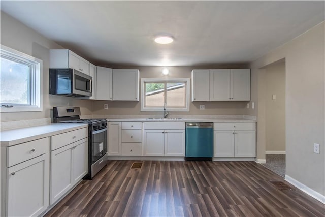11 Grove St, Adams, NY 13605 - kitchen with stainless steel appliances, dark wood-style floors, and plenty of natural light