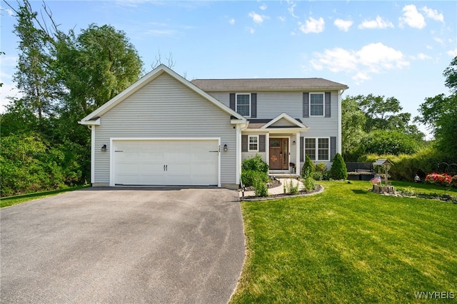720 N Star Rd, Elma, NY 14052 - traditional-style house with asphalt driveway, a front lawn, and a garage