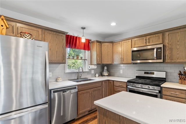 720 N Star Rd, Elma, NY 14052 - kitchen featuring stainless steel appliances, light countertops, tasteful backsplash, pendant lighting, and recessed lighting