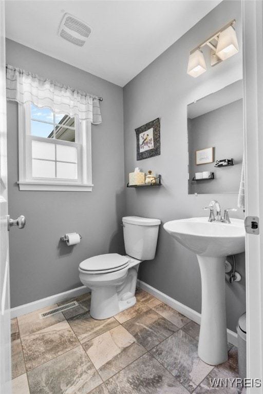 720 N Star Rd, Elma, NY 14052 - bathroom featuring toilet and stone finish flooring