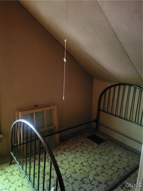 182 Seneca Rd, Webb, NY 13420 - additional living space featuring vaulted ceiling