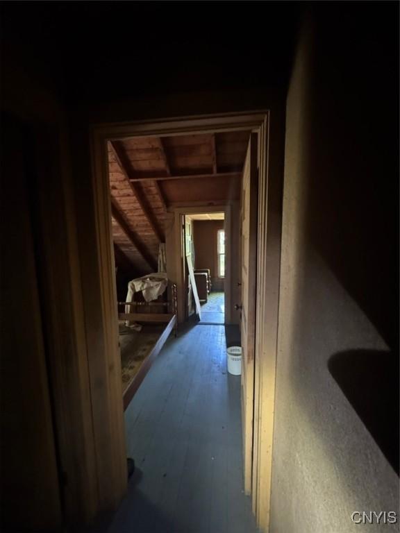 182 Seneca Rd, Webb, NY 13420 - corridor with hardwood / wood-style flooring and lofted ceiling