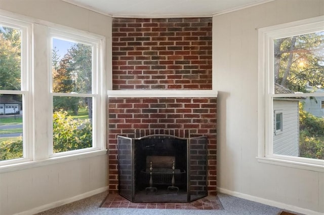 23 Peacock St, Auburn, NY 13021 - detailed view of crown molding, carpet, and a fireplace