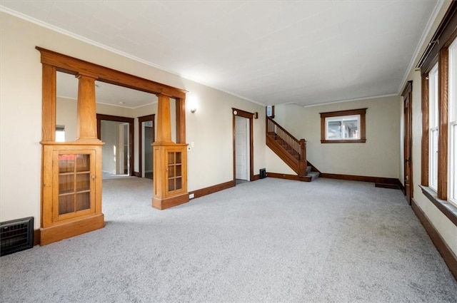 23 Peacock St, Auburn, NY 13021 - unfurnished room with carpet, crown molding, and stairway