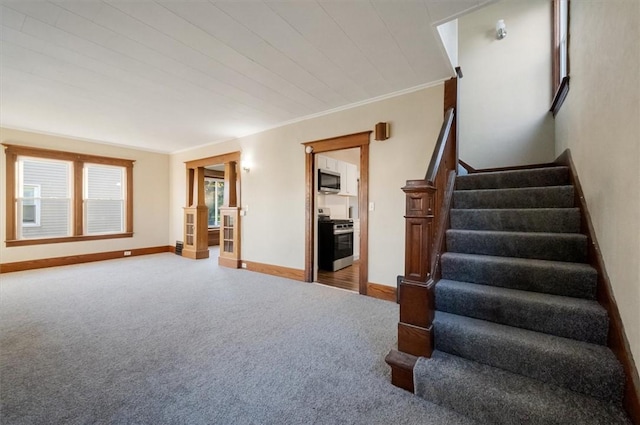 23 Peacock St, Auburn, NY 13021 - spare room featuring carpet flooring and stairs