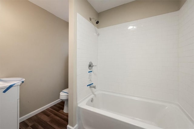 23 Peacock St, Auburn, NY 13021 - full bath featuring wood finished floors, vanity, and washtub / shower combination