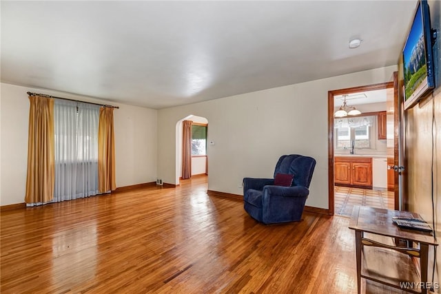 2104 Walnut Ave, Niagara Falls, NY 14301 - unfurnished room featuring arched walkways and light wood-style floors