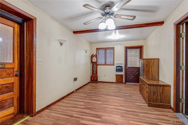 2104 Walnut Ave, Niagara Falls, NY 14301 - foyer entrance with heating unit, light wood-type flooring, ceiling fan, and beamed ceiling