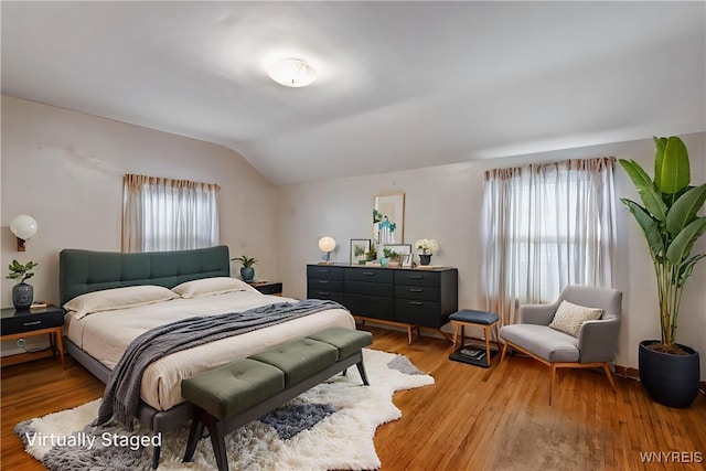 2104 Walnut Ave, Niagara Falls, NY 14301 - bedroom with vaulted ceiling and light wood-style floors