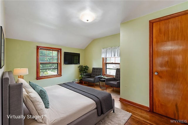 2104 Walnut Ave, Niagara Falls, NY 14301 - bedroom featuring lofted ceiling and wood finished floors