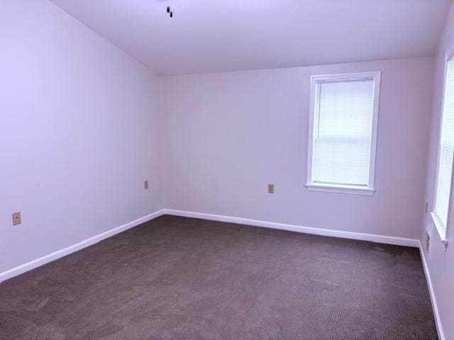 19 California Ave, Horseheads, NY 14903 - spare room with dark carpet and baseboards