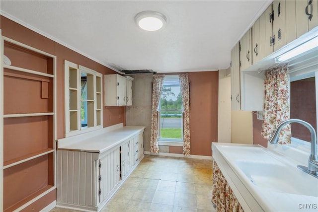 388 Sutton Rd, Schroeppel, NY 13132 - bathroom featuring a sink and ornamental molding