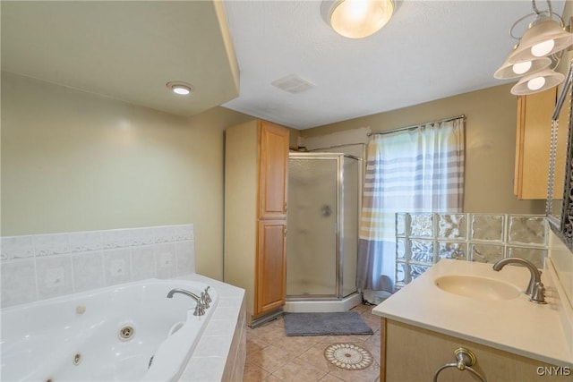 388 Sutton Rd, Schroeppel, NY 13132 - bathroom with a shower stall, a tub with jets, vanity, and tile patterned floors