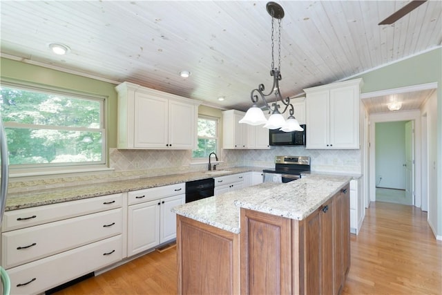 5343 Cedarwood Ln, Conesus, NY 14435 - kitchen with black appliances, light wood-type flooring, white cabinetry, tasteful backsplash, and light stone counters