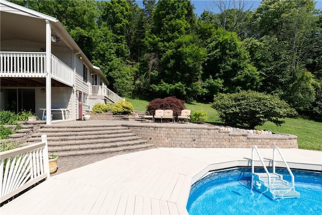 5343 Cedarwood Ln, Conesus, NY 14435 - outdoor pool featuring a patio, stairway, and a wooden deck
