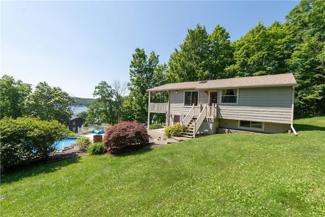 5343 Cedarwood Ln, Conesus, NY 14435 - view of front of house featuring a front lawn, an outdoor pool, and stairs