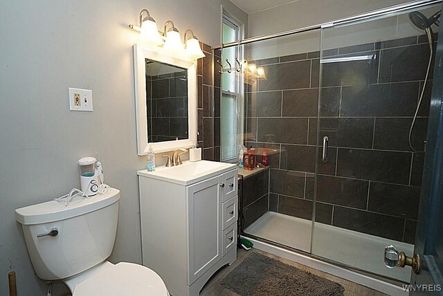 57 Christiana St, North Tonawanda, NY 14120 - full bathroom featuring a stall shower and vanity