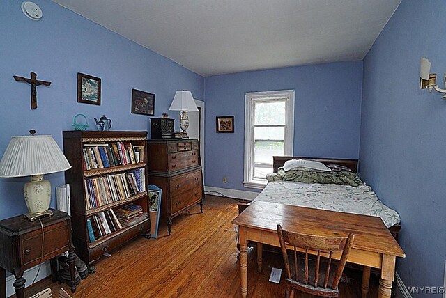 57 Christiana St, North Tonawanda, NY 14120 - bedroom featuring wood finished floors and baseboards