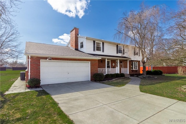 288 W Maplemere Rd, Amherst, NY 14221 - traditional-style house featuring a porch, brick siding, an attached garage, and concrete driveway