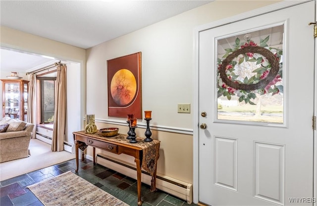 288 W Maplemere Rd, Amherst, NY 14221 - entrance foyer with a baseboard radiator and stone tile floors