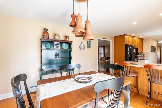 288 W Maplemere Rd, Amherst, NY 14221 - dining space with light wood-style flooring and recessed lighting
