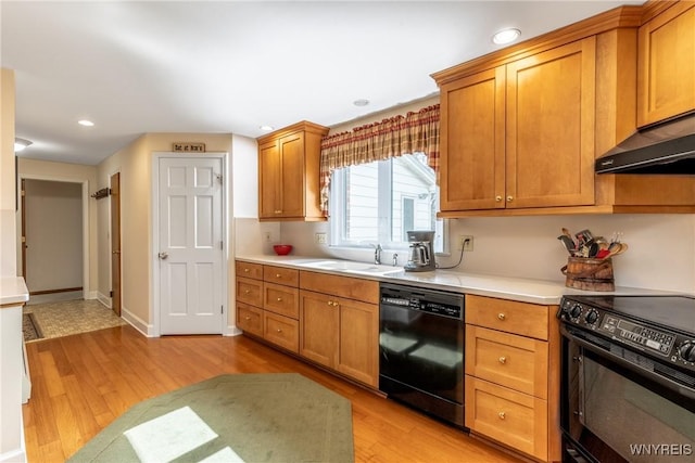 288 W Maplemere Rd, Amherst, NY 14221 - kitchen featuring black appliances, light wood finished floors, under cabinet range hood, light countertops, and recessed lighting