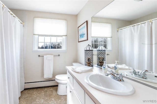288 W Maplemere Rd, Amherst, NY 14221 - bathroom with a baseboard heating unit, healthy amount of natural light, vanity, and a shower with shower curtain