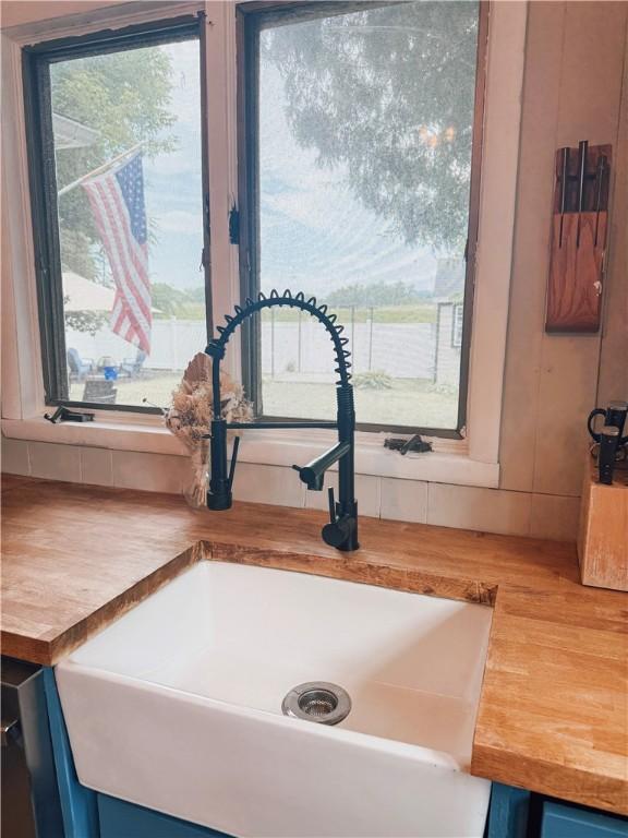 459 W Water St, Elmira City, NY 14905 - kitchen view of butcher block countertops and blue cabinetry