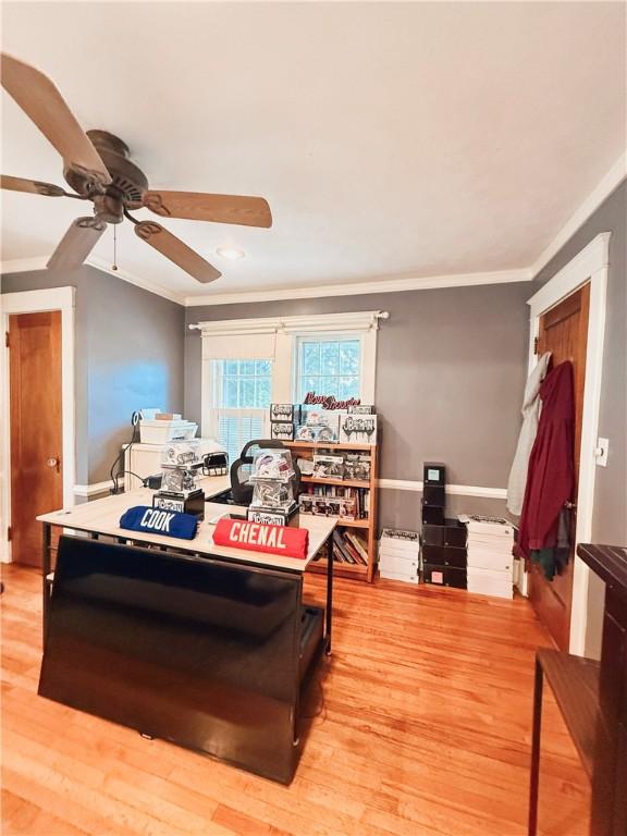 459 W Water St, Elmira City, NY 14905 - living room featuring crown molding, light wood finished floors, and ceiling fan