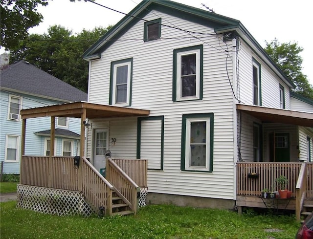 30 Mitchell St, Norwich, NY 13815 - rear view of house featuring a wooden deck