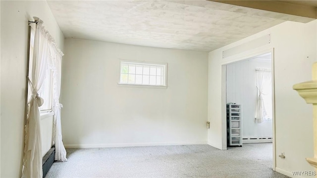 350 S 2nd St, Lewiston, NY 14092 - carpeted spare room featuring baseboard heating and a textured ceiling