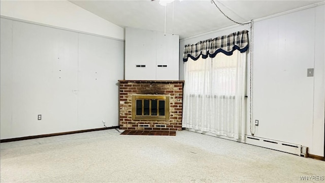350 S 2nd St, Lewiston, NY 14092 - unfurnished living room with a fireplace, carpet flooring, a ceiling fan, vaulted ceiling, and a baseboard radiator