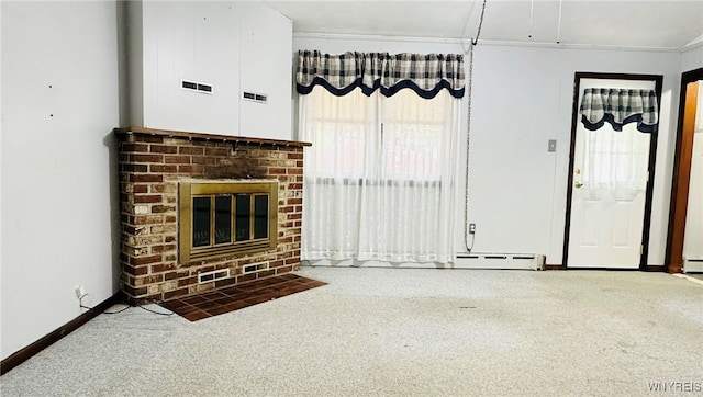 350 S 2nd St, Lewiston, NY 14092 - unfurnished living room featuring healthy amount of natural light, a fireplace, carpet flooring, a baseboard heating unit, and crown molding
