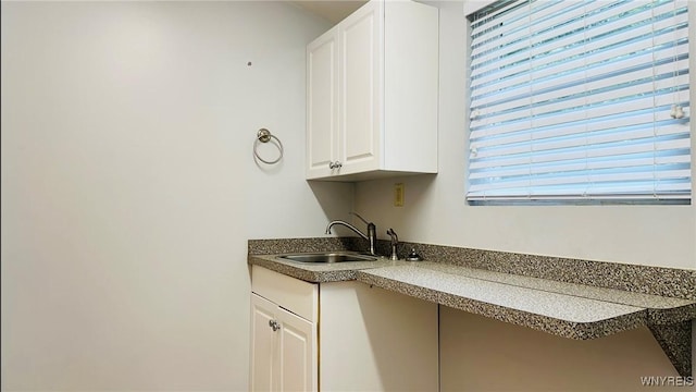 350 S 2nd St, Lewiston, NY 14092 - kitchen featuring white cabinetry and dark countertops