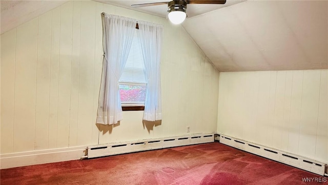 350 S 2nd St, Lewiston, NY 14092 - bonus room featuring carpet, vaulted ceiling, a ceiling fan, wood walls, and baseboard heating