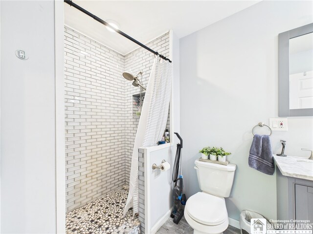 709 Main St, Olean, NY 14760 - bathroom featuring vanity and tiled shower