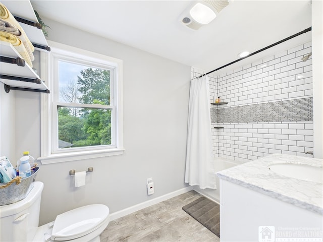 709 Main St, Olean, NY 14760 - full bath featuring vanity, shower / bath combo with shower curtain, wood finished floors, and recessed lighting