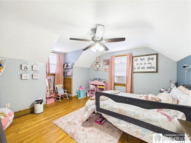 709 Main St, Olean, NY 14760 - bedroom with wood finished floors, vaulted ceiling, and ceiling fan