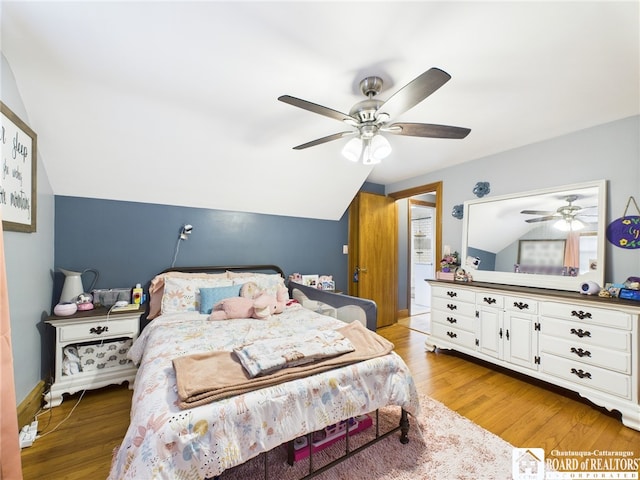 709 Main St, Olean, NY 14760 - bedroom with vaulted ceiling, light wood-type flooring, and ceiling fan