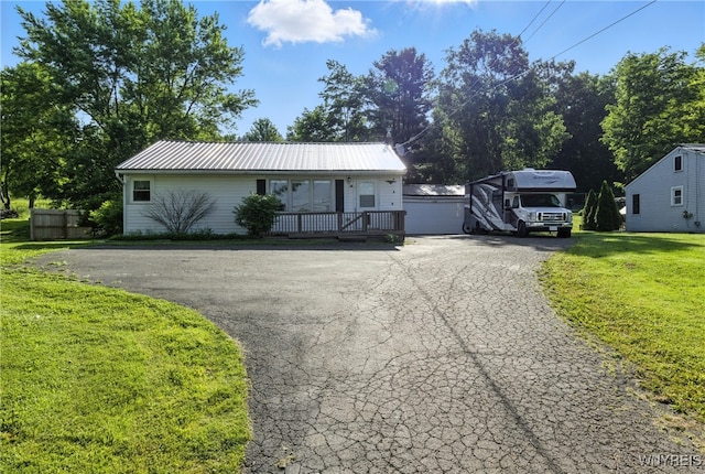 11583 Gowanda State Rd, North Collins, NY 14111 - ranch-style home featuring a front yard and a metal roof