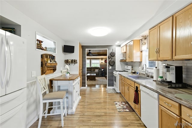 11583 Gowanda State Rd, North Collins, NY 14111 - kitchen with white appliances, light wood-type flooring, backsplash, and light brown cabinetry