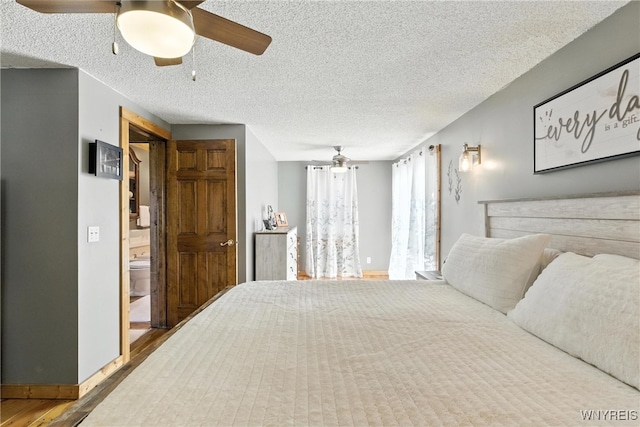 11583 Gowanda State Rd, North Collins, NY 14111 - bedroom with wood finished floors, a textured ceiling, and ceiling fan