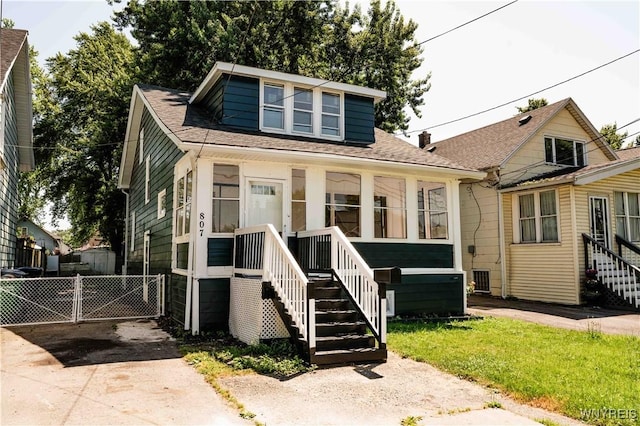 807 Tifft St, Buffalo, NY 14220 - bungalow with roof with shingles
