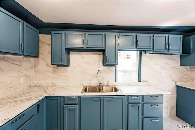 807 Tifft St, Buffalo, NY 14220 - kitchen featuring backsplash and blue cabinets