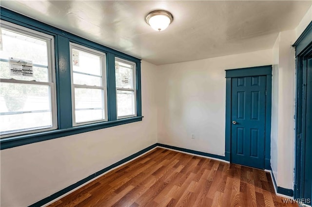 807 Tifft St, Buffalo, NY 14220 - spare room featuring plenty of natural light and dark wood finished floors