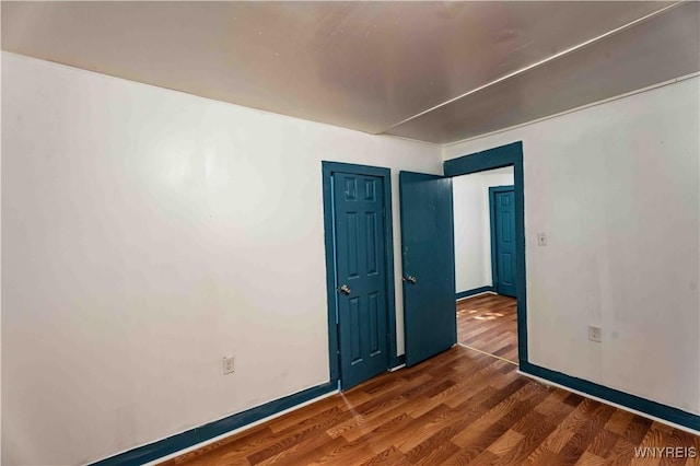 807 Tifft St, Buffalo, NY 14220 - spare room with wood finished floors and baseboards