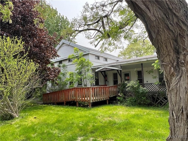 4535 Holley Byron Rd, Clarendon, NY 14470 - rear view of property with a yard and a wooden deck