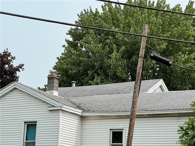 4535 Holley Byron Rd, Clarendon, NY 14470 - exterior view of a shingled roof and a chimney