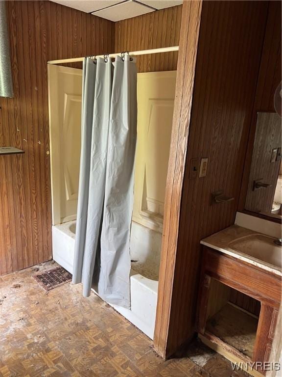 4535 Holley Byron Rd, Clarendon, NY 14470 - full bathroom with shower / tub combo with curtain, vanity, and wooden walls