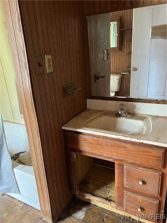 4535 Holley Byron Rd, Clarendon, NY 14470 - bathroom featuring vanity and wooden walls